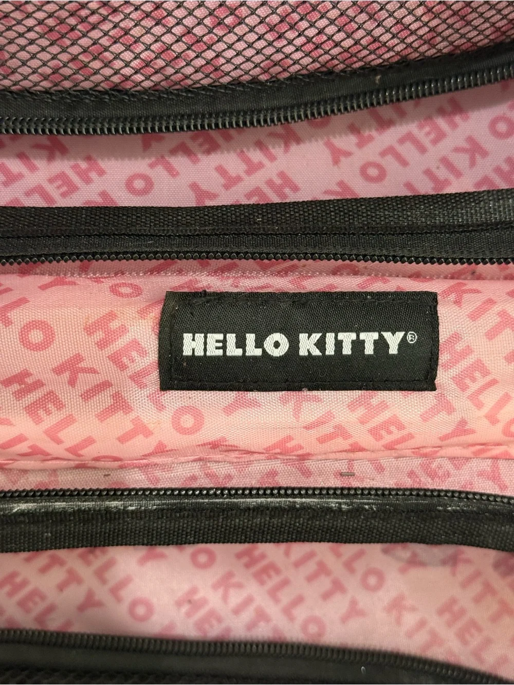NWT FŪL Hello Kitty 13” Metallic Pink Hardshell Suitcase w/Logo Design